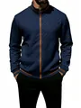Close-up detail of navy blue quilted men's zip-up jacket with contrast tan trim and collar - S / Tops / Navy Blue