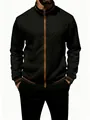 Close-up detail of men's black quilted zip-up jacket featuring stylish brown contrast trim - S / Tops / Black
