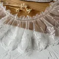 Close-up of white butterfly embroidered mesh lace trim with pleated ruffle detail - 1 Meter Pack (Approx 10cm Width) / Off-White