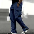 Detailed side view of navy blue cargo pants with multi-pockets and snap button cuffs - S / Bottoms / Navy Blue
