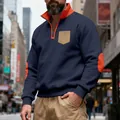 Detail view of men's quarter-zip fleece sweatshirt with orange collar and elbow patches - S / Tops / Navy Blue