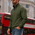 Detail of men's olive green quarter-zip standing collar sweatshirt with chest patch - S / Army Green