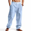 Detail showing the breathable linen texture and loose fit of light blue casual pants - Light Blue