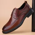 Polished brown leather Derby shoes with crocodile texture and brogue details for men. - 38 / Lace-up Shoes / Brown