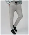 Detailed view of light grey men's quick-dry sports pants with breathable mesh texture - Grey Apricot