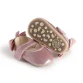 Detail view of pink glitter baby pre-walker shoes with non-slip patterned soft soles - 11cm / Pink