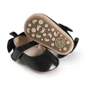 Close-up of black glitter baby pre-walker shoes with anti-slip sole detail - 11cm / Black
