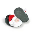 Detailed macro view of Santa Claus plush baby winter shoes with anti-slip dotted soles - Green