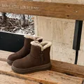 Solid brown faux fur-lined snow boots with side zipper and thick anti-slip rubber sole - 35 / Brown