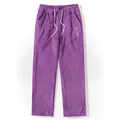 Close-up view of men's purple fleece casual pants featuring white drawstring and embroidery. - Purple