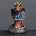 Ceramic cobra backflow incense burner with blue crystal ball and gold crown - Snake And Lotus Bead