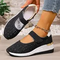 Detail of black breathable wedge sneakers with hollow-out design and velcro strap. - 37 / Black