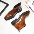 Classic brown leather Chelsea boots with brogue detailing and thick black lug soles. - 38 / Brown Plush Lined