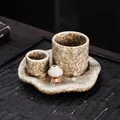 Rustic ceramic mushroom palo santo holder with spotted glaze on a dark wooden tray - Beige Brown Spotted