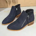 Detail view of navy blue suede ankle boots with stylish double side zippers and block heel - Navy Blue