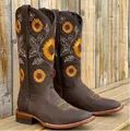 Detail view of dark brown cowboy boots with embroidered yellow sunflowers and square toes - 36 / Dark Brown