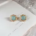 Vintage French style stud earrings with light green enamel and pearl border detail - Blue Silver Pin