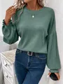 Vue détaillée d'un t-shirt vert à manches longues et col rond avec des manches lanterne - S / Hauts / Vert olive