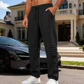 Pantaloni casual neri ampi da uomo caratterizzati da dettagli a pieghe sulle ginocchia - Taglia S / Pantaloni e gonne / Nero