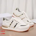 Detailed view of white platform sneakers showing 3.0cm / 1.18in sole height - 36 / White