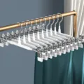 Perchas para pantalones de acero inoxidable con revestimiento antideslizante y pinzas. - Blanco Brillante