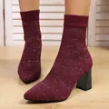 Macro view of sparkly wine red knit sock boots with stylish chunky black block heels - 36 / Burgundy
