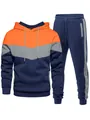 Detailed view of men's three-color patchwork tracksuit hoodie and pants set - Orange Gray Blue