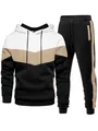 Detailed view of the men's tri-color patchwork hoodie and jogger pants athletic set - White Khaki Black