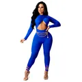 Detail view of royal blue sexy jumpsuit with front cutout and decorative gold waist chain - Blue