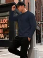 Men's waffle knit Henley shirt in navy blue, detailed texture in an urban setting - S / Tops / Navy Blue