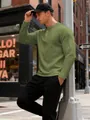 Close-up of the green waffle-knit jacquard texture on this men's long-sleeve shirt - S / Tops / Army Green