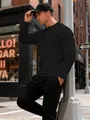 Slim fit men's long sleeve black Henley shirt featuring a waffle knit grid texture - S / Tops / Black
