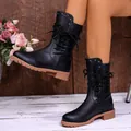 Vintage black lace-up women boots with studded detail and thick brown rubber sole - Black