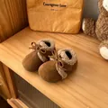 Zapatos de calabaza para niños en color marrón con pelo sintético y lazo - Talla 22 (Longitud Interior 14.5cm) / Beige