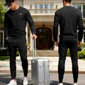 Men's black jacquard knit tracksuit set showing front and back views with travel case - S / Top And Bottom / Black