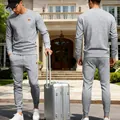 Elegant grey men's jacquard knit tracksuit shown in front and back lifestyle views - S / Top And Bottom / Light Gray