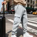 Pantaloni cargo da uomo grigi con trama a nido d'ape, vestibilità comoda e tasche - Taglia S / Pantaloni e gonne / Grigio chiaro