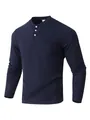 Close-up of navy blue men's waffle knit Henley shirt with buttons and chest pocket - Navy Blue