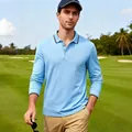 Detalle del polo de golf de manga larga azul claro para hombre en el campo - S / Tops / Azul claro