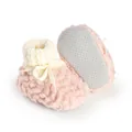 Close-up of pink plush baby walking boots with anti-slip sole and knit cuff - 11cm / Pink