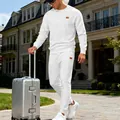 Men's white jacquard knit sweatshirt and sweatpants set styled with a suitcase - S / Top And Bottom / White