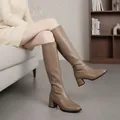 Elegant taupe knee-high faux leather boots for women featuring a sturdy chunky heel - 35 / Khaki