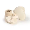 Close-up view of cream baby bow floor socks featuring the anti-slip dotted sole - Insole Length 11cm / Bowknot Style (3314) / Apricot