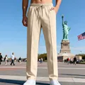 Pantaloni casual beige da uomo, vestibilità dritta ampia con comoda coulisse in vita - Taglia S / Pantaloni e gonne / Albicocca