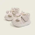 Zapatos de invierno beige para niñas con forro de felpa suave y adorno de lazo pompón - Talla 19 (Longitud Interior 12CM) / Blanco Roto