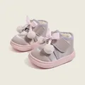 Girls' warm winter snow boots featuring pink bow and fur pompom, metallic finish - Size 19 (Inner length 12cm) / Pink