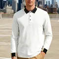 Detail van wit jacquard poloshirt voor heren met lange mouwen en gestreepte kraag. - S / Tops / Wit