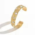 Detailed view of gold-plated stainless steel cuff bracelet with marble stones and crystals. - White Marble Hammered Style (S3218F)