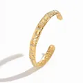Detailed view of gold-plated stainless steel cuff bracelet with star moon engraving - Star Moon Sun Polished Style (S3218I)