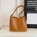 Minimalist caramel brown large capacity tote bag featuring retro knotted shoulder straps - Yellow